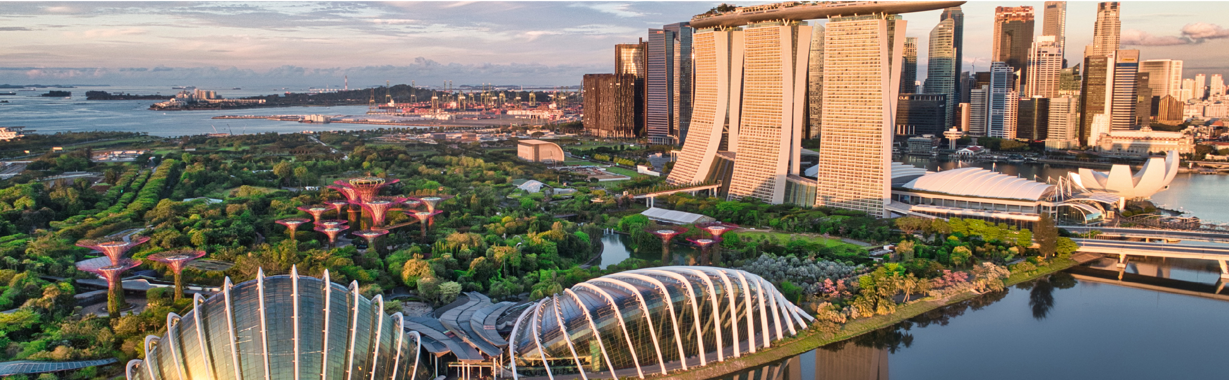 Cityscape of Singapore featuring iconic landmarks with a focus on sustainability.